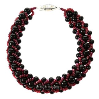 Handcrafted Black and Purple Slinky Austrian Pearl Bracelet