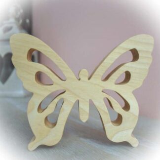 Freestanding wooden butterfly with intricate fretwork design