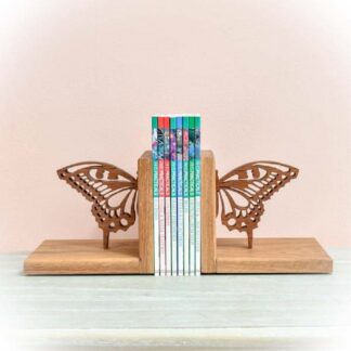 Handmade wooden bookends forming butterfly when placed together