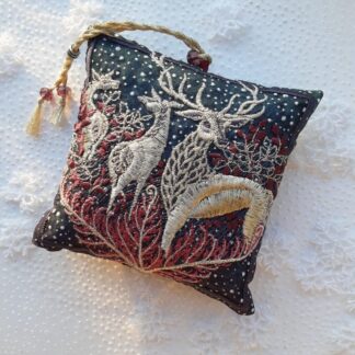 First Snowfall Forest Hart, embroidery on a lavender bag, Dark woodland scene of wild stag with two deer hinds.