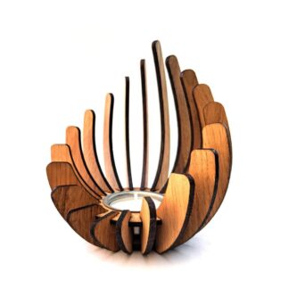 Tealight holder made from wood. Available in birch, oak, walnut or mahogany.