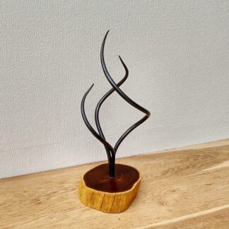 Hand Forged Metal Sculpture Set In Wood