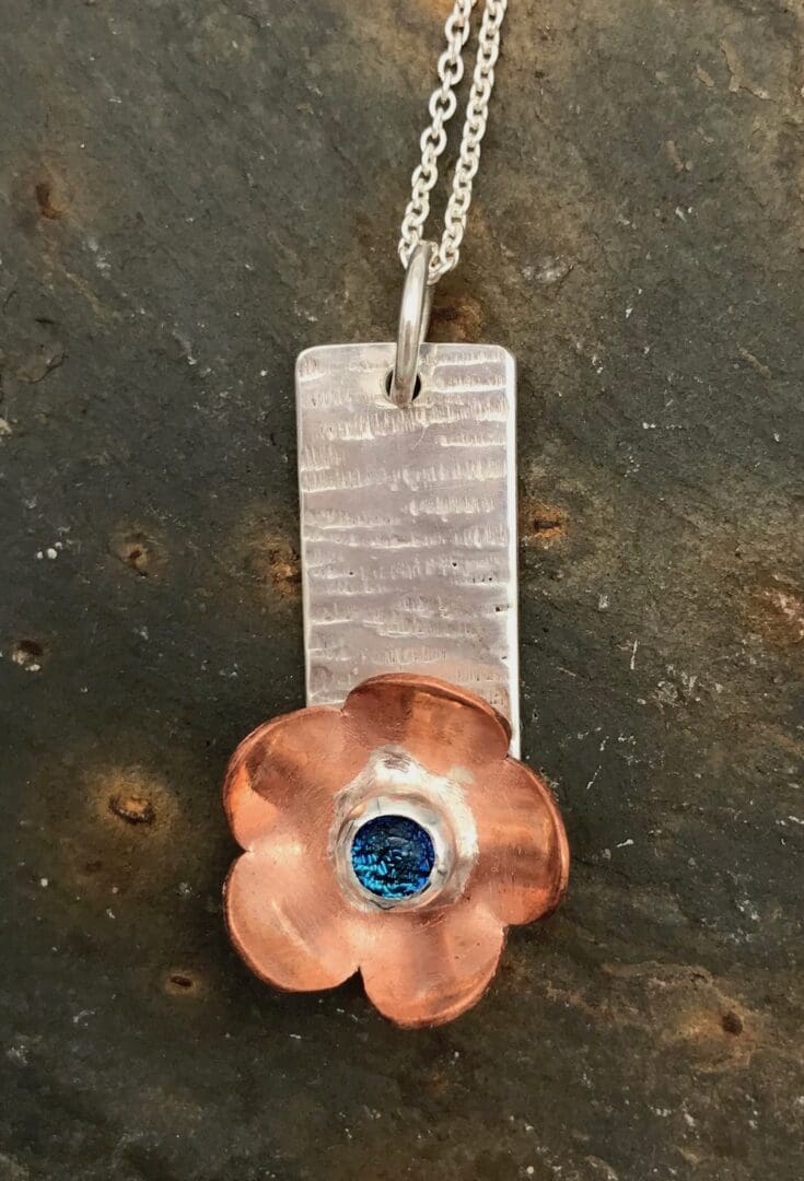 Handmade, eco-silver, copper and blue dichroic glass flower pendant