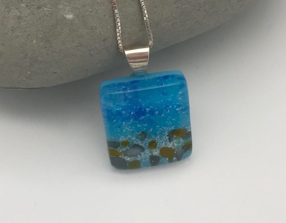 Handmade fused glass seascape pendant with sand from Australia
