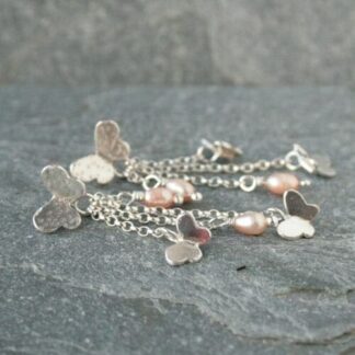 Sterling silver long butterfly and pearl earrings
