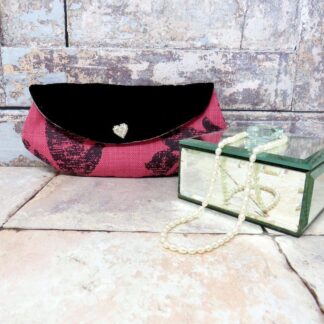 Mini clutch with a velvet flap