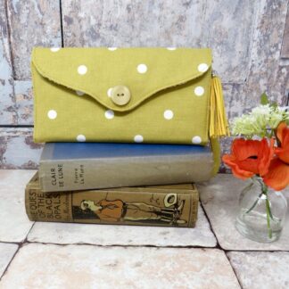 Mustard spot clutch wallet