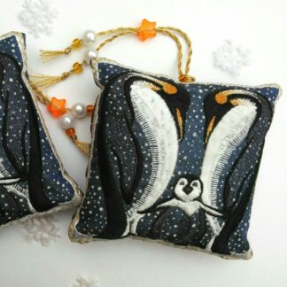 A family of PENGUINS on a snowy lavender bag with beaded hanging loop or tie.