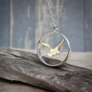 Bird On A Wire Sterling Silver & Brass Pendant Necklace