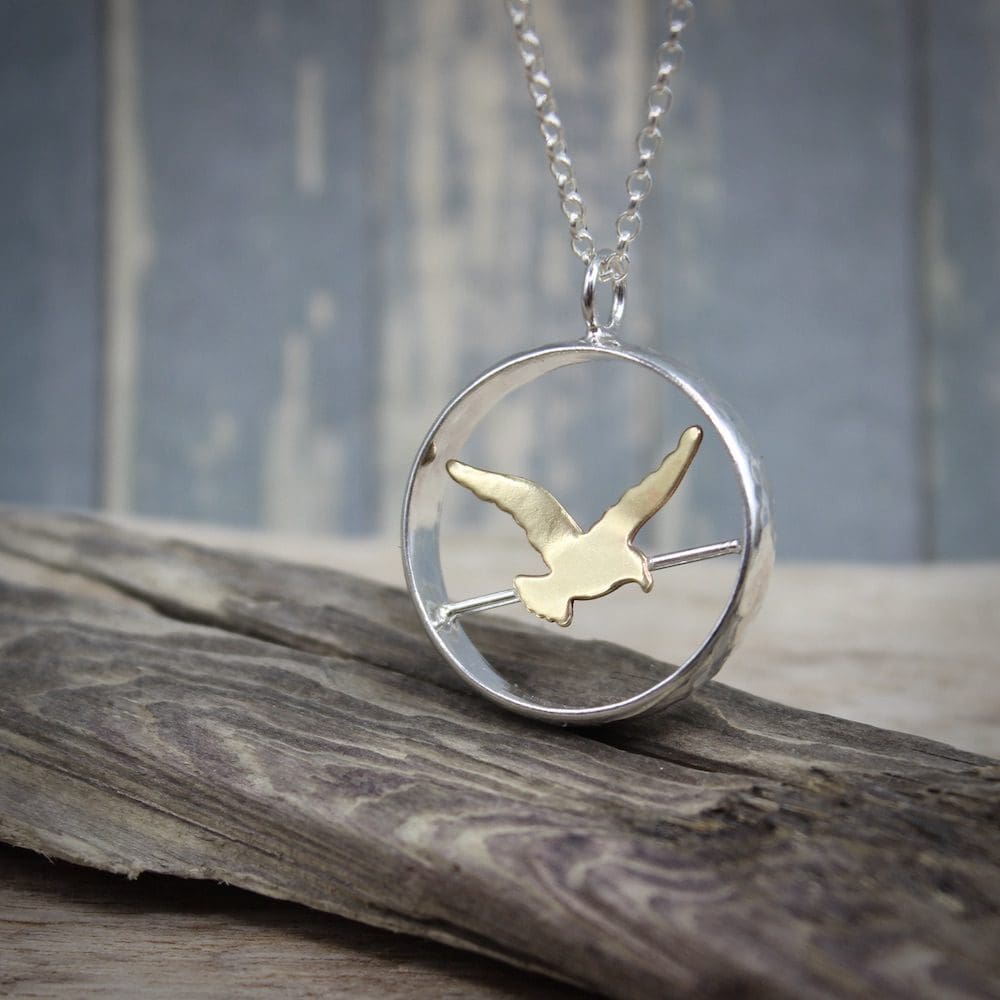 Bird On A Wire Sterling Silver & Brass Pendant Necklace