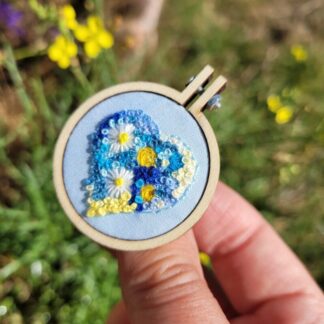 Hand embroidered blue heart filled with flowers brooch 4cm