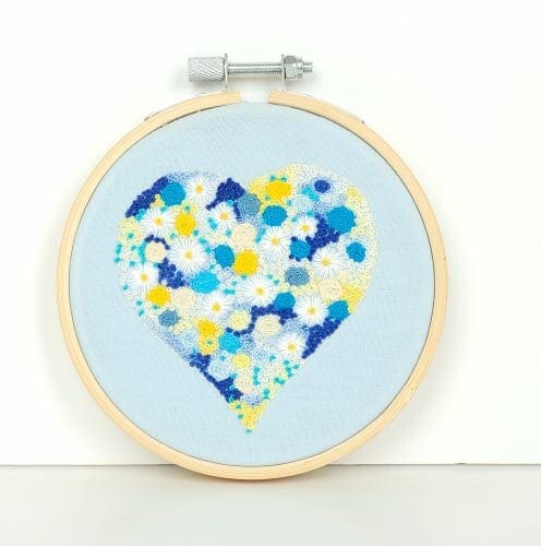 Blue flower filled heart hand embroidered 4 inch hoop wall hanging - Image 2