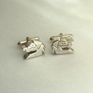 Silver cufflinks, chunky dog heads