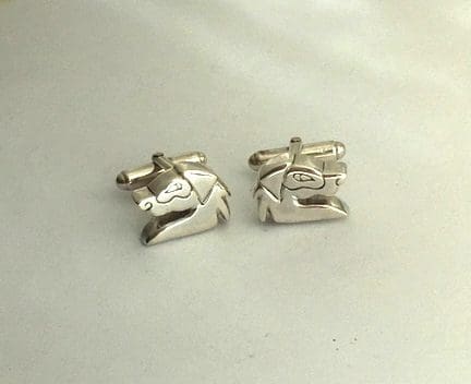 Silver cufflinks, chunky dog heads