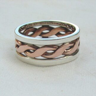 Silver ring with copper twist