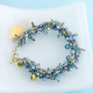 Ocean Inspired Gold and Iridescent Blue Beaded Bracelet
