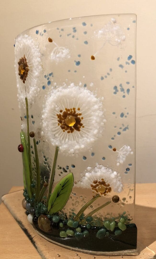 side version of daandelion heads curved fused glass ornament