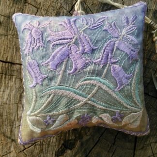 Soft Pastel colours of BLUEBELL flowers on an embroidered lavender bag with beaded hanging loop or tie.