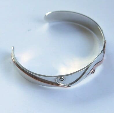 Silver bangle with silver and copper bird - Image 8