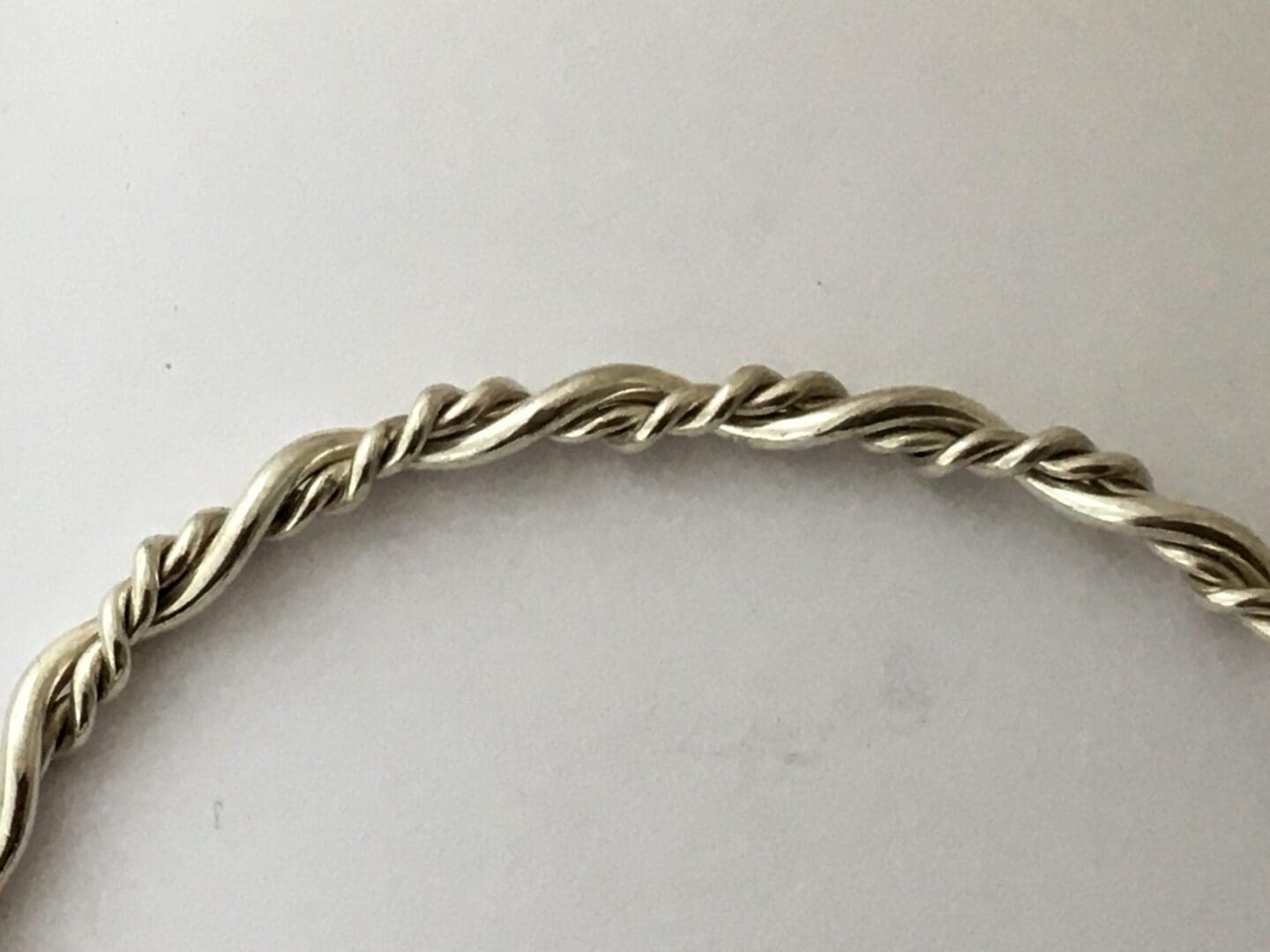 Twisted silver bangle with garnet ends - Image 2