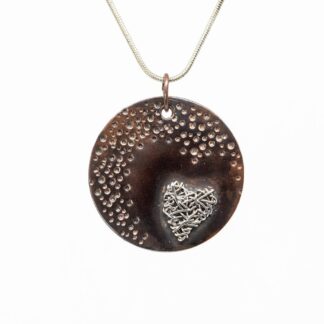 Heart in heart pendant