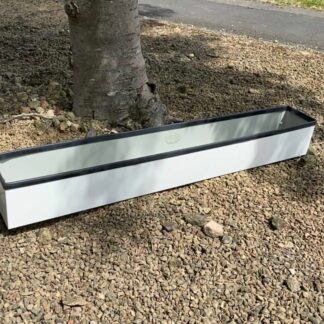 white metal window sill planter