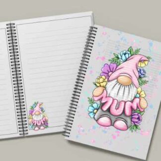 An open A5 spiral-bound notebook. The cover shows a pink-hatted gonk with flowers and the word "MUM". The internal lined pages feature a matching smaller gonk illustration in the bottom corner.