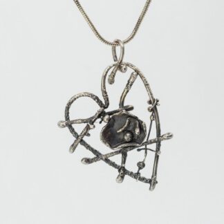Organic shape heart pendant