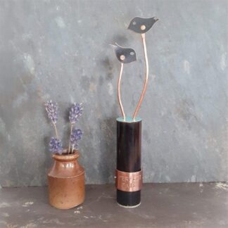 Recycled copper bird sculpture titled Perfect Pair