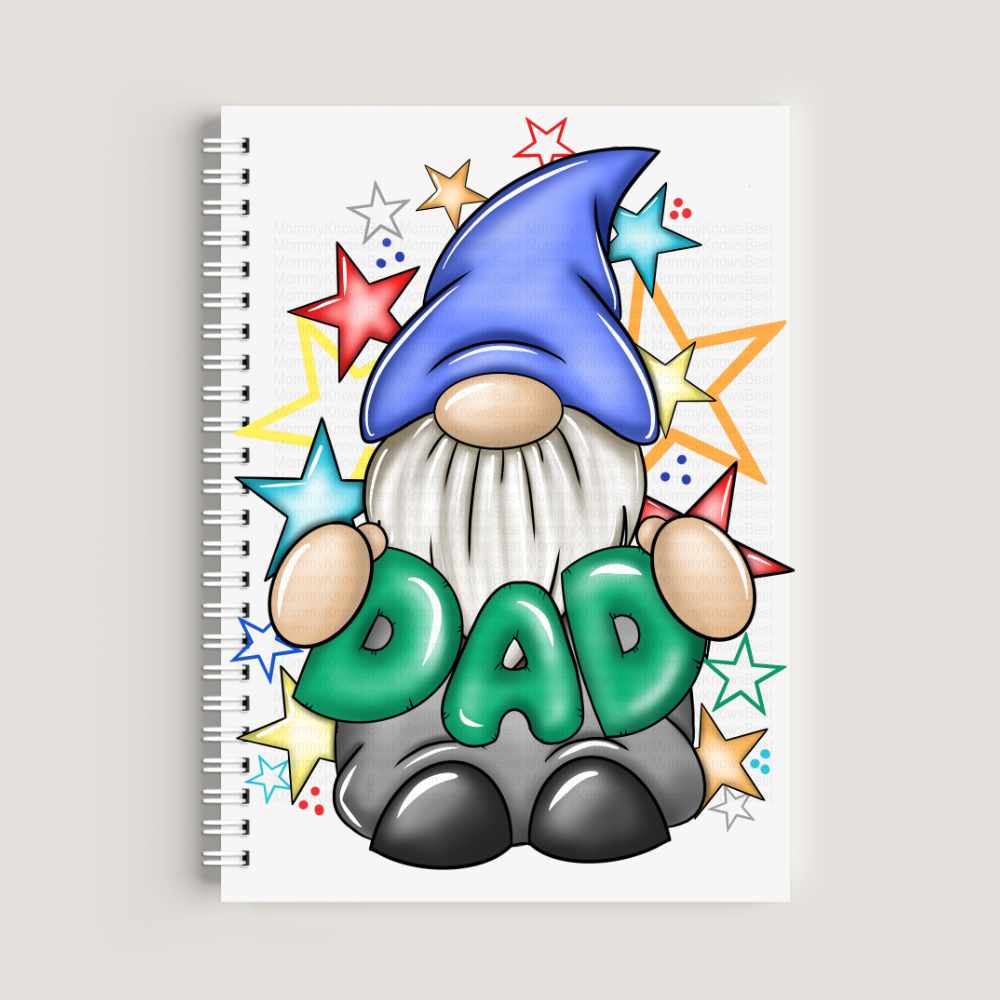 A spiral-bound A5 notebook featuring an illustration of a gnome with a tall blue hat and a long white beard holding green letters that spell "DAD." The background is filled with colorful drawn stars in red, blue, and yellow.