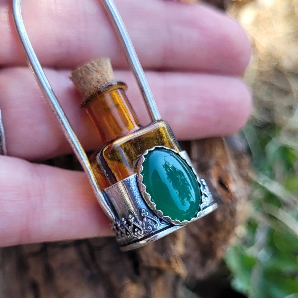 Spellweaver Amber Onyx Bottle Pendant