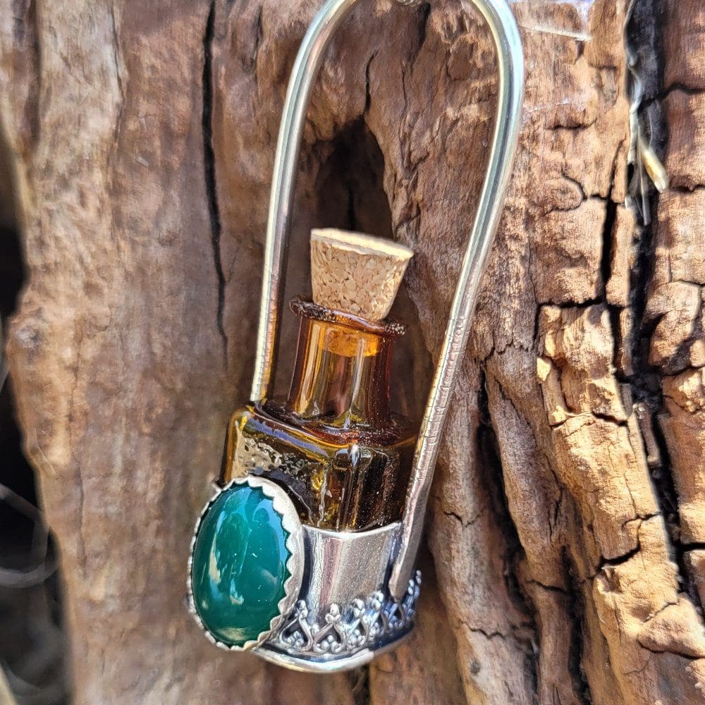 Spellweaver Amber Onyx Bottle Pendant