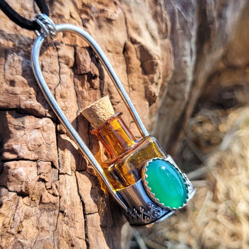 Spellweaver Amber Onyx Bottle Pendant