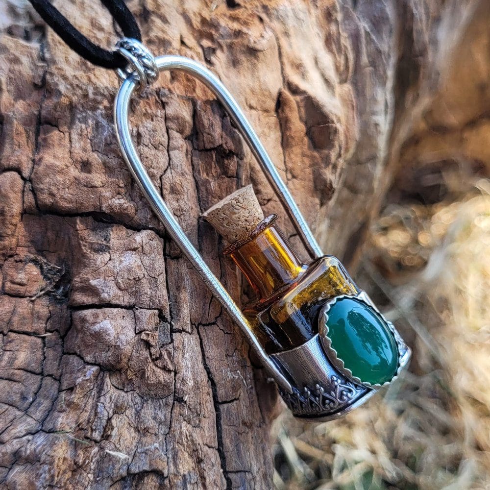 Spellweaver Amber Onyx Bottle Pendant