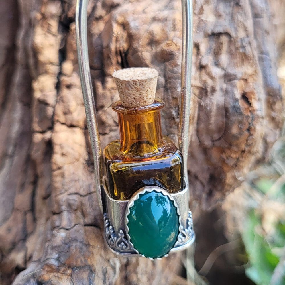 Spellweaver Amber Onyx Bottle Pendant