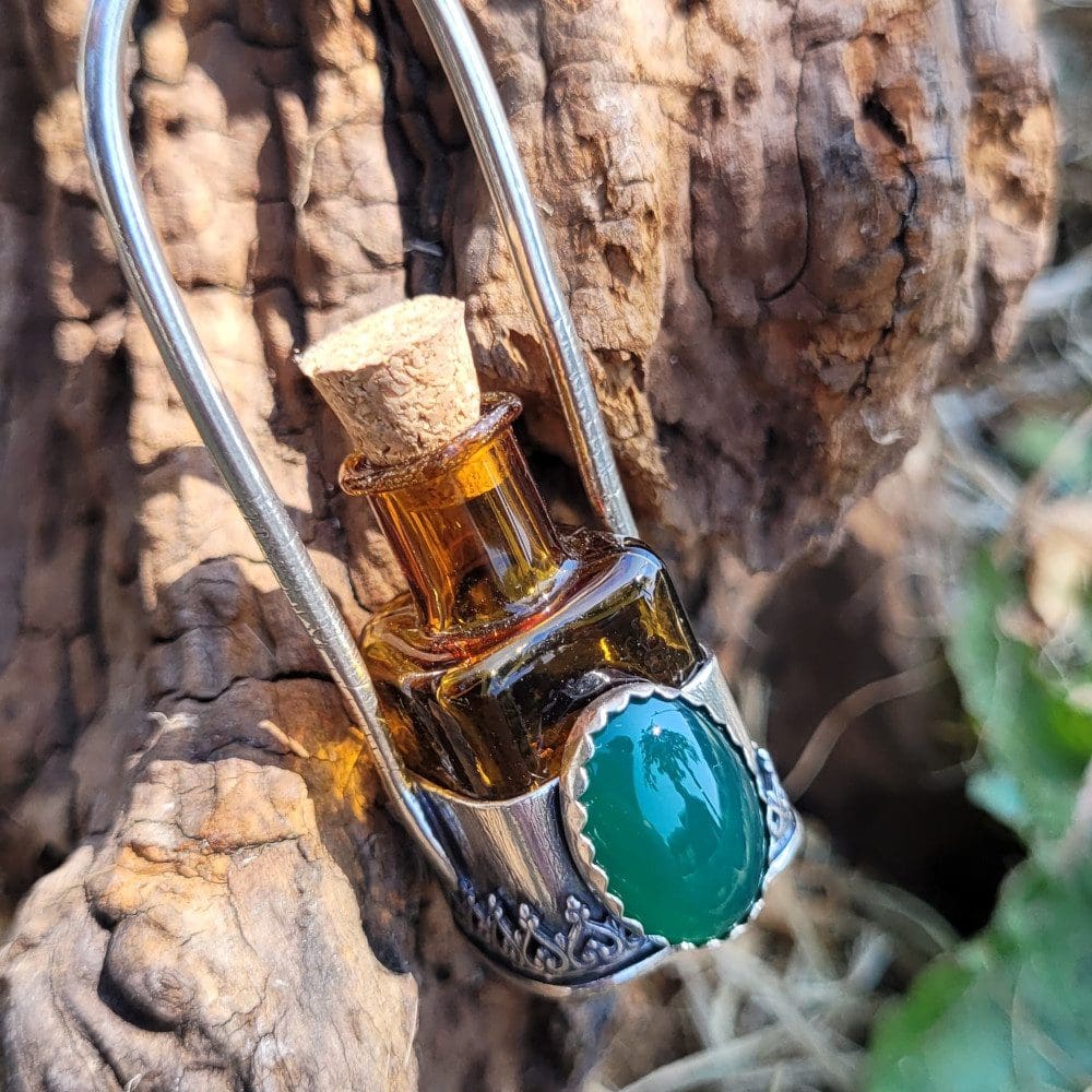 Spellweaver Amber Onyx Bottle Pendant