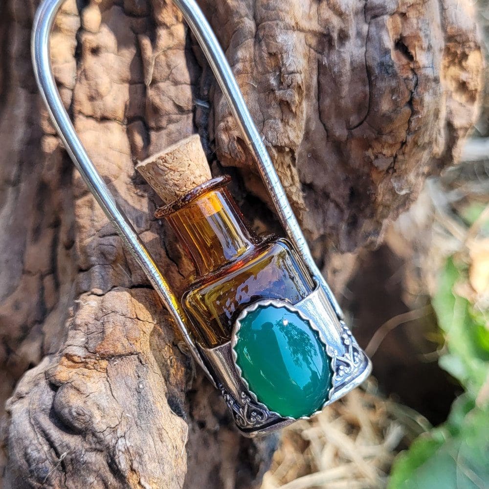 Spellweaver Amber Onyx Bottle Pendant