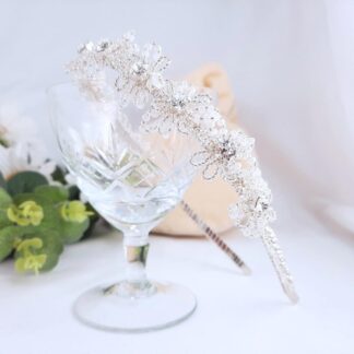 Tiara headband with pearl and silver flowers with have crystal centres.