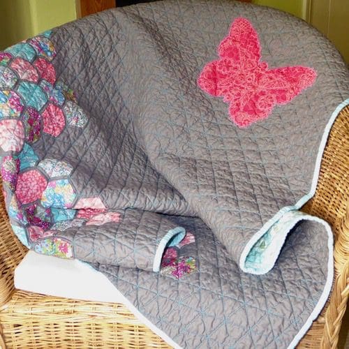 Modern grey hexagon and butterfly baby quilt