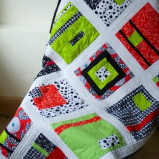 Modern bright baby quilt white, red, green, black