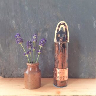 Recycled copper sculpture titled no rain no rainbows