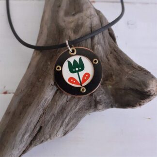 Recycled copper and tin pendant on a rubber necklet