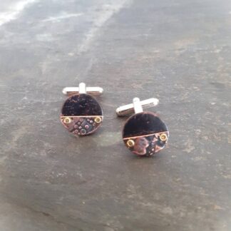 Copper cufflinks with a steampunk theme