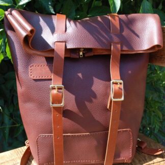 Italian leather roll top backpack with zip opening and adjustable straps