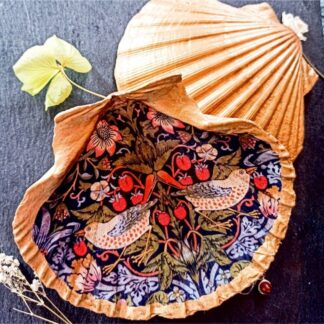 William Morris Strawberry Thief Gilded Decoupage Scallop Shell Trinket Jewellery Dish rests on a dark table