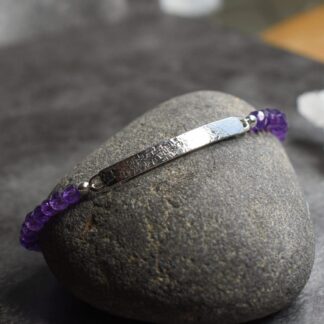 Amethyst bar bracelet with deep purple gemstones and textured Argentium Silver bar.