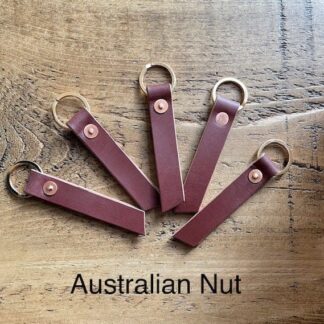 Key fobs in Bakers English leather with brass flat split ring and copper rivet.