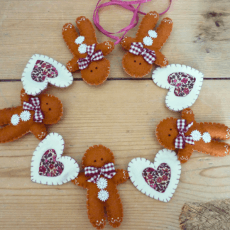Gingerbread man and pink floral hearts Garland