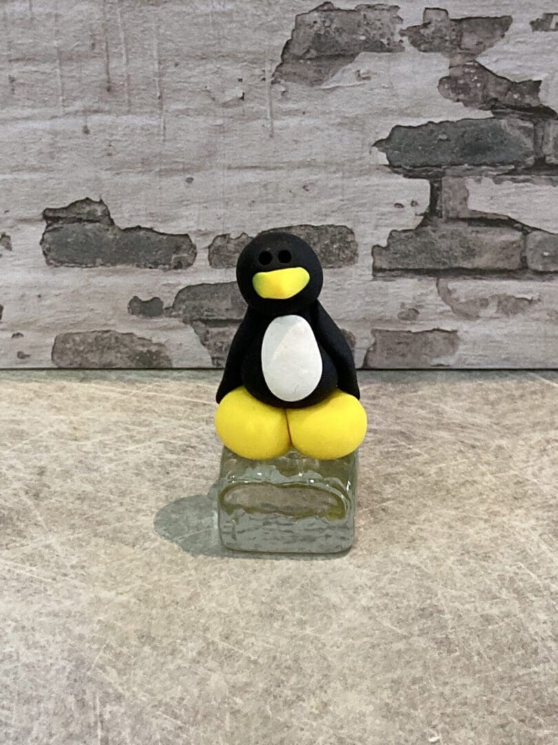 penguin clay figure on ice cube handmade - Image 3