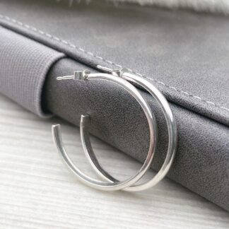 Sterling silver half hoop earrings